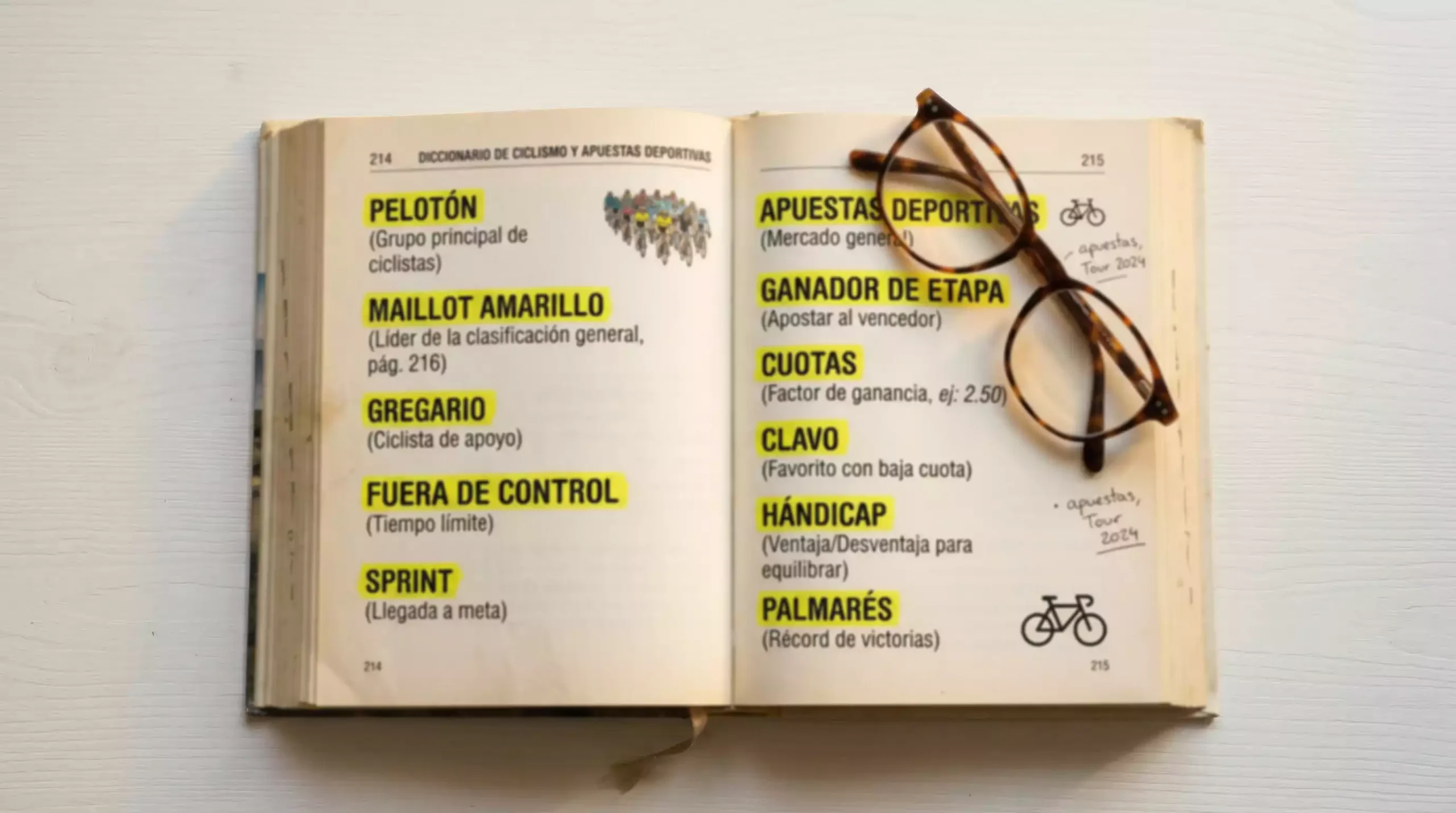 Libro abierto con términos de ciclismo y apuestas deportivas resaltados